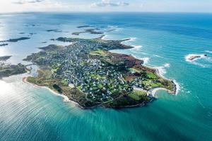 an aerial view of a small island in the ocean at Soizic' house in Trébeurden