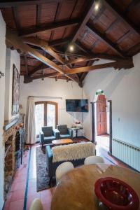 a living room with a couch and a table at Casona Don Roque in Salta