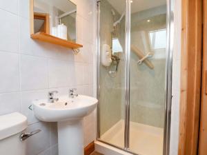 a bathroom with a sink and a shower at Boundcliffe Farm in Allerston +41 photos