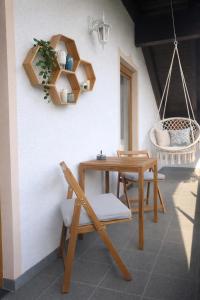 a dining room with a table and chairs at Ferienhaus 147 in Sekull