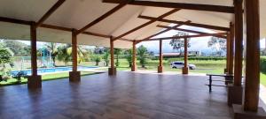 an empty patio with a view of a pool at Perla Arenal View in Fortuna +6 photos