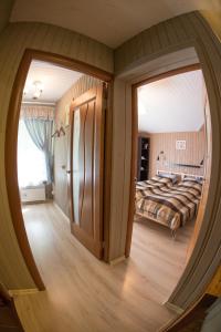 Postel nebo postele na pokoji v ubytování Guest House U Pruda