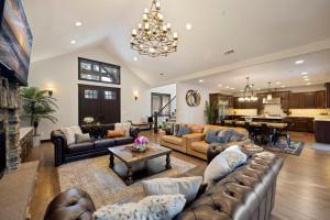 a large living room with couches and a table at Basecamp at Suncadia in Cle Elum