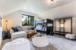 a living room with a couch and a table at Suncadia Luxe in Cle Elum