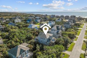 an aerial view of a house with a satellite at 7834 - Royal - T in Frisco