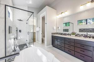 a bathroom with a tub and a shower and a sink at Casa Mia in Cle Elum +48 photos