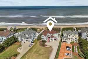 an aerial view of a house on the beach at 4099 - 3-2-1 Relax in Duck