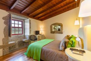 Postel nebo postele na pokoji v ubytování Quinta do Olival + 37 fotografií