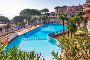 a swimming pool on the roof of a resort at Casa Concetta in Rapallo