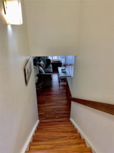 a view of a hallway with a living room at Unit 11 Beautiful Ocean View in Pahala