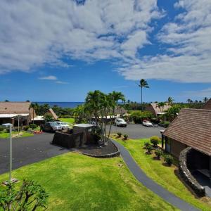 a view of a parking lot at a resort at 58 2 bedroom 2 bath in Pahala