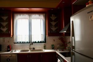 a kitchen with a sink and a window at Arcadia di Vito in Tripoli +39 photos