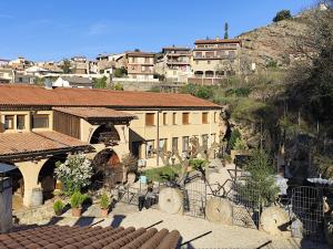 a view of a building in a city with houses at Raco del Tosca in Beceite +70 photos