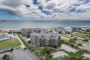 an aerial view of a building next to the ocean at 7660 - Robyn's Nest in Avon