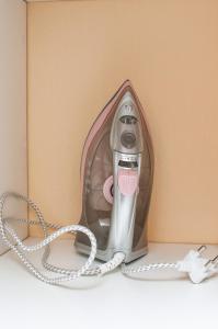 a hair dryer in a box with a cord at Ocean View Villas B09 in Port Edward