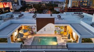 a view from the roof of a building with a swimming pool at Sense28 Edgewater, an AvantStay Hotel in Miami