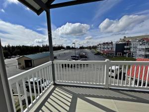 a balcony with a view of a parking lot at ML 345 Ski-InOut Slope Views Sleeps 6 Steps to Ballhooter in Snowshoe