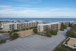 an aerial view of an apartment complex with the ocean at 2971 - Seabbatical in Duck