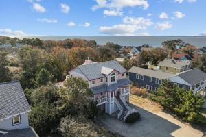 an aerial view of a residential neighborhood with houses at 3947 - Leg-O Duck in Duck