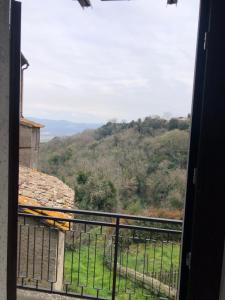 a view from a window of a mountain at La Casa di Siria in Bomarzo