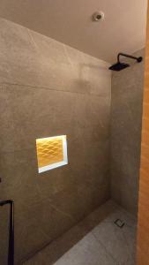 a bathroom with a window on the wall at STREET MALL Luna N6-3 in Puebla