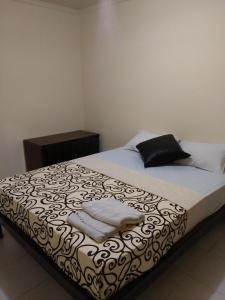 Postel nebo postele na pokoji v ubytování BB Homestay Two