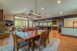 a dining room and living room with a table and chairs at 4BR Home w/ 2 Decks, Near Lake & Ski Resorts in Truckee