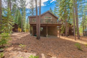 a tree house in the woods with a deck at 4BR Home w/ 2 Decks, Near Lake & Ski Resorts in Truckee