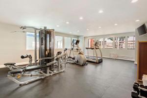 a gym with two treadmills and two exercise bikes at Best Western Plus Eagle Vail Airport in Eagle