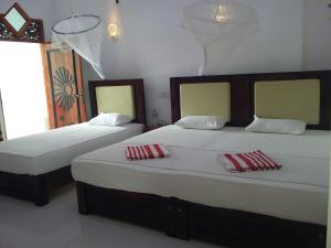 Postel nebo postele na pokoji v ubytování Peacock Reach Hotel