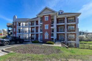 a building with a truck parked in front of it at Amazing 2 bed 2 bath with Gorgeous View in Branson