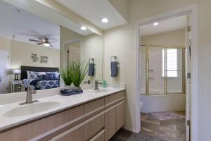a bathroom with a sink and a shower at Amazing 2 bed 2 bath with Gorgeous View in Branson +30 photos