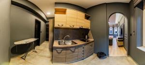 a kitchen with a sink and a counter top at Villa Sveti Gorgi in Ohrid +44 photos