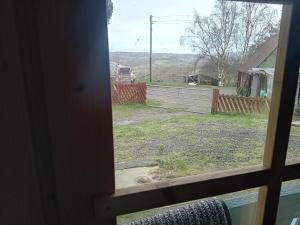 a view of a yard from a window at Moonlight View in Newtown