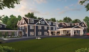a rendering of a large house with a yard at Hotel Bridgton in Bridgton