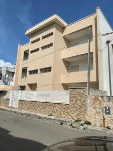 a building on the side of a street at Monolocali Angelica in Porto Cesareo