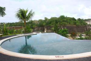 Bazén v ubytování Puri Pandawa Resort nebo v jeho okolí