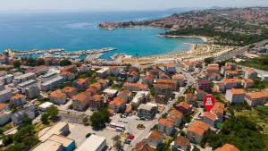 an aerial view of a city and the ocean at Exclusive Apartment MARIJA in Strožanac