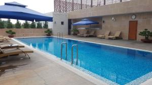 Bazén v ubytování Petro Hotel nebo v jeho okolí