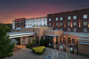 an aerial view of a hotel at night at Hilton Garden Inn Fort Worth Medical Center in Fort Worth