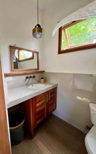 a bathroom with a sink and a mirror at Casa Isla - Private Retreat in Galapagos in Puerto Baquerizo Moreno +28 photos