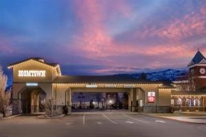 a building with a parking lot in front of it at Best Western Plus Boomtown Casino Hotel in Verdi