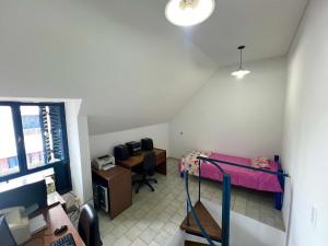 a small room with a bed and a desk at Corro 8 in Córdoba