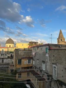 a view of a city with buildings at TiTò Apartment in Naples