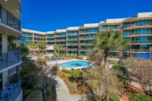 an aerial view of a resort with a swimming pool at Phoenix on the Bay 1213 in Orange Beach