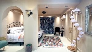a small bedroom with a bed and a window at Bao Di East Coast in Honghai +11 photos