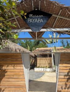 a sign for the michigan payapa on a building at Maison PAYAPA PORT BARTON in San Vicente