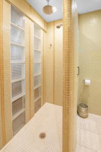 a bathroom with a shower and a toilet in it at Pikes Peak Paradise Bed and Breakfast in Woodland Park +60 photos
