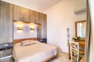 Postelja oz. postelje v sobi nastanitve Myrtos Mare Suites