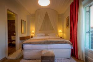 Posteľ alebo postele v izbe v ubytovaní Enastron Guesthouse